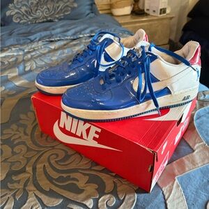 Nike Air Force 1 Blue and White Sneakers.